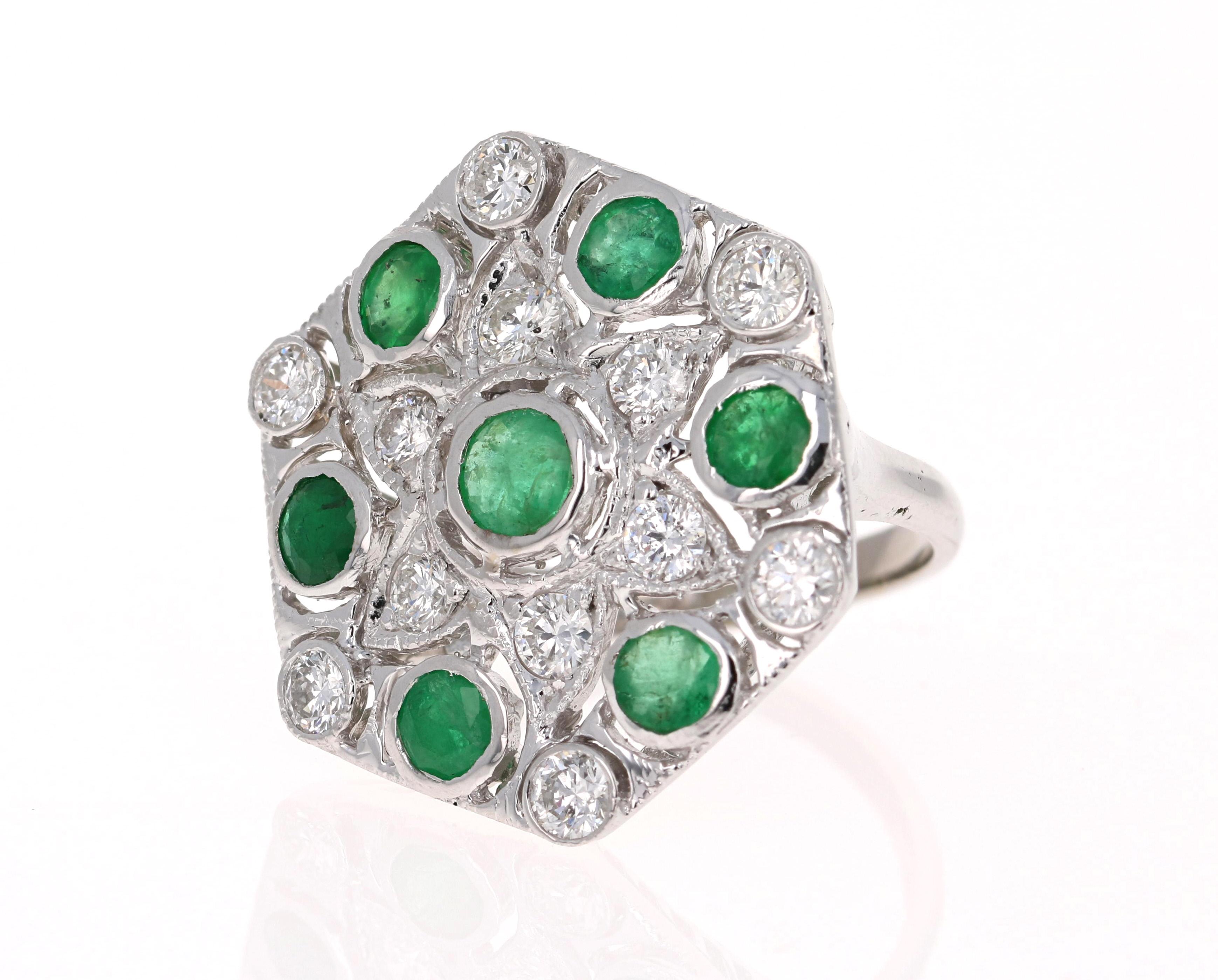 7 Round Cut Emeralds that weigh 2.04 Carats.
12 Round Cut Diamonds that weigh 1.39 Carats (Clarity: SI2, Color: F)
14K White Gold with an approximate gold weight of 8.5 Grams.
It is a size 7 and can be resized, if needed, at no additional charge.
