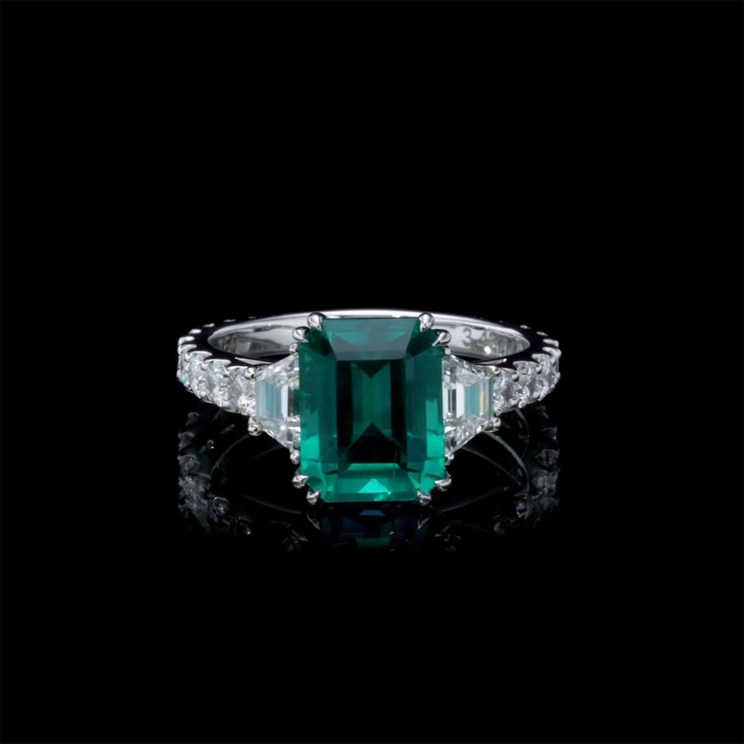 The verdant green of rare natural emerald, the smooth, radiant beauty of pure gold, and the sparkling white of natural diamonds come together in Maia- a wearable work of art. This luxury natural emerald diamond ring brings a lush touch of color to