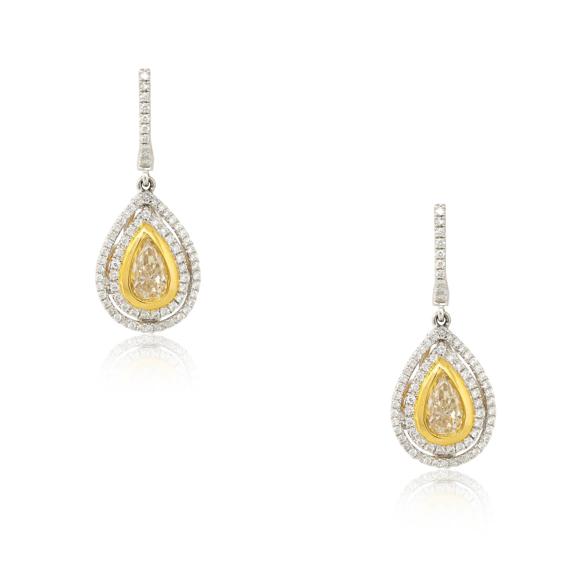 Pear Cut 3.43 Carat Pear Shaped Yellow Diamond Drop Earrings 18 Karat in Stock For Sale