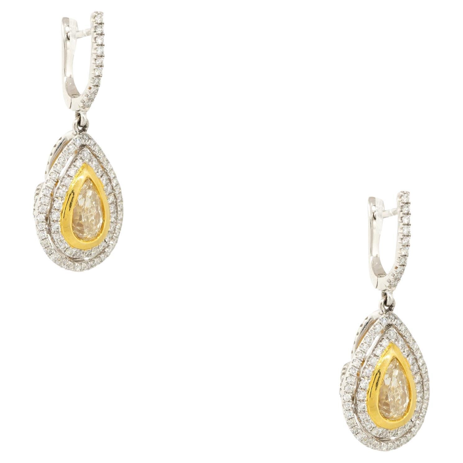 3.43 Carat Pear Shaped Yellow Diamond Drop Earrings 18 Karat in Stock For Sale