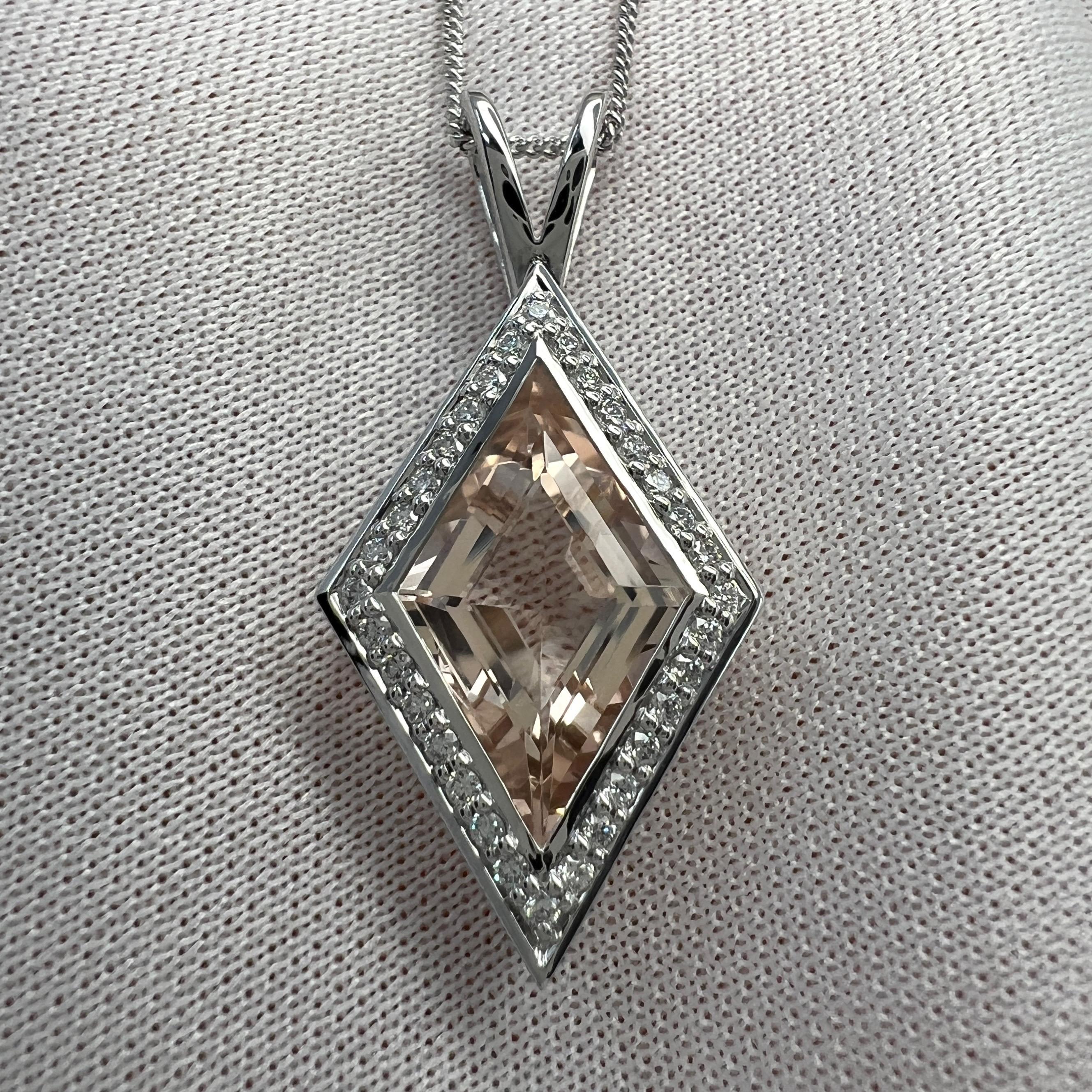 Fine Natural Peach Pink Morganite & Diamond 18k White Gold Halo Pendant Necklace. 3.43ct Total.

3.20 Carat natural morganite with a beautiful peach pink colour and excellent clarity, VVS. 
Also has a unique kite cut which shows lots of brightness