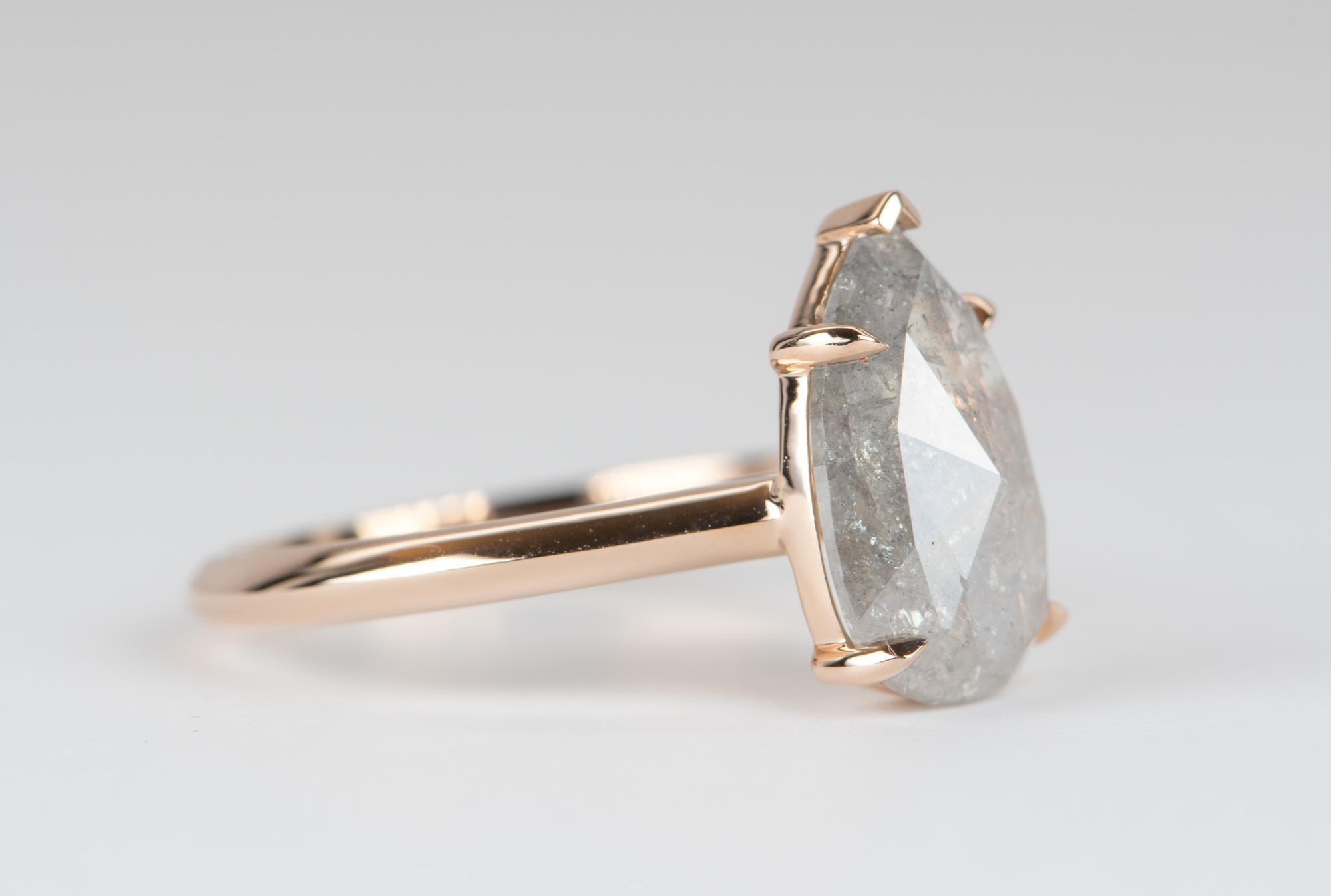 pear shaped salt and pepper diamond ring