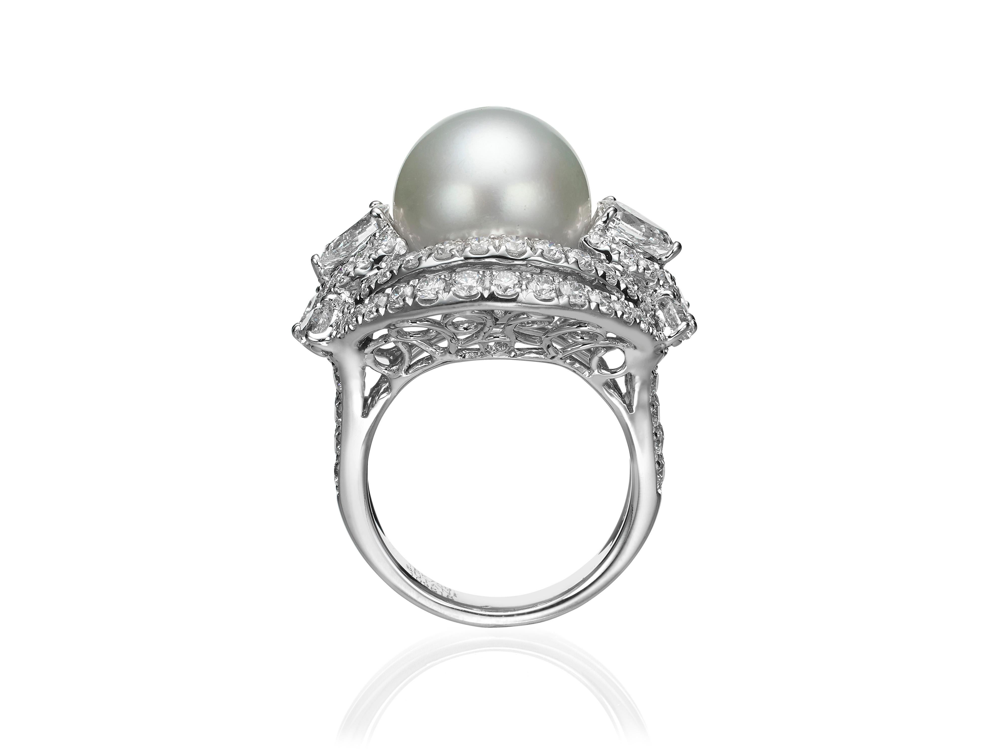 Butani's Diamond and South Sea Pearl Cocktail Ring features a sizeable 13mm South Sea Pearl at the center framed by 3.45 carats of glistening white diamonds in an 18K white gold setting.  Currently a ring size US 7.  For other sizes, please contact