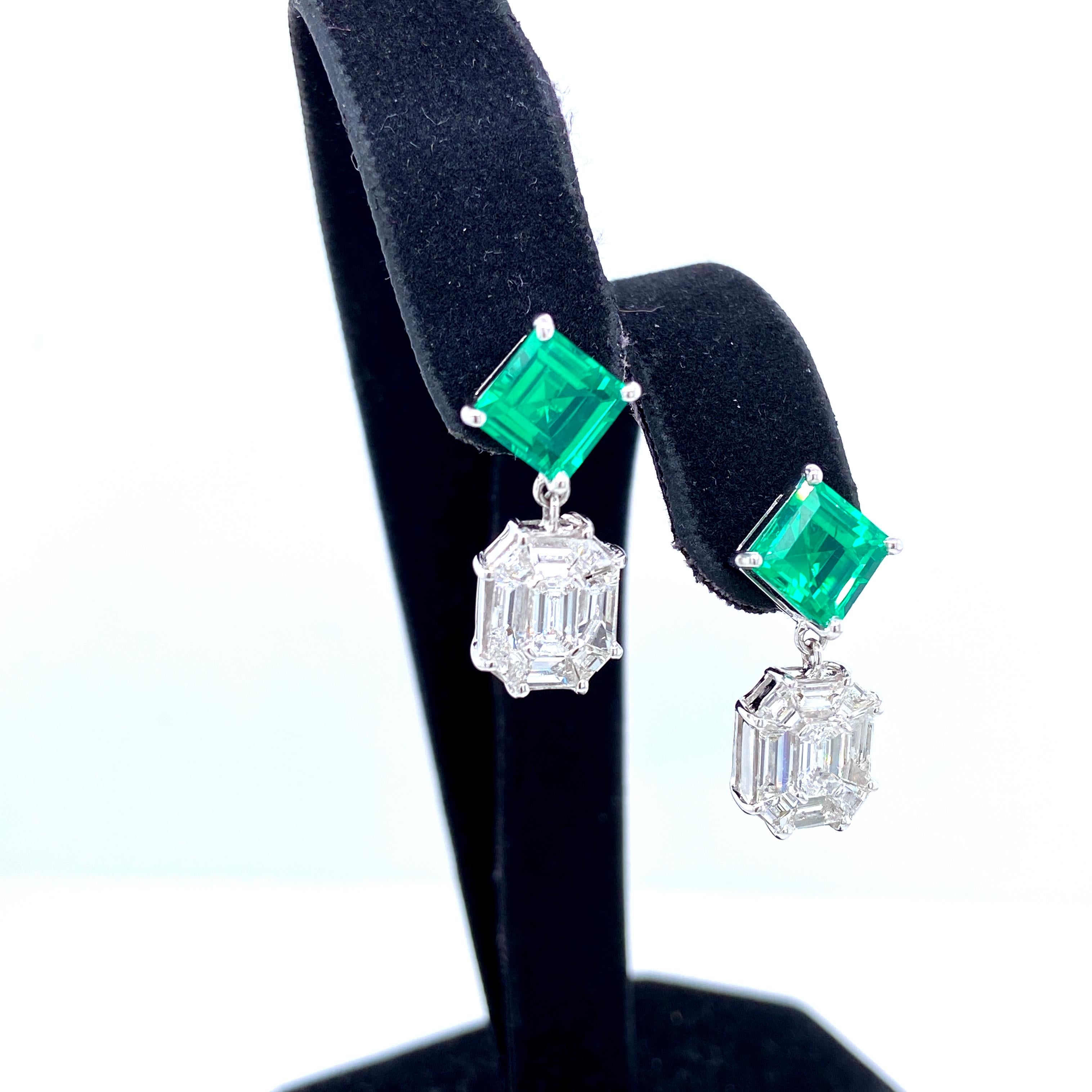 Emerald And White Diamond Gold Earrings:

An elegant pair of earrings, it features 3.45 carat of green Emerald beryl and 2.25 carat of illusion-set white diamonds! The emerald are beryl doublets of fine quality and colour, with superb brilliance and