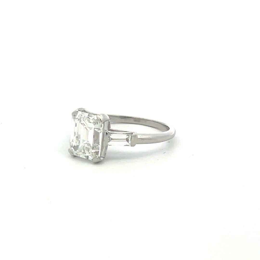 3.45 Carat Emerald Cut and Baguette Shape Diamond Platinum Engagement Ring For Sale 2