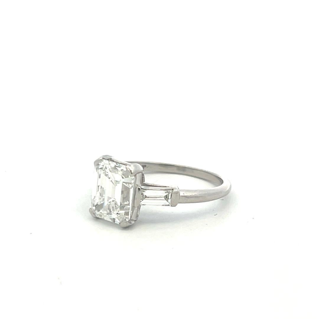 3.45 Carat Emerald Cut and Baguette Shape Diamond Platinum Engagement Ring For Sale 3