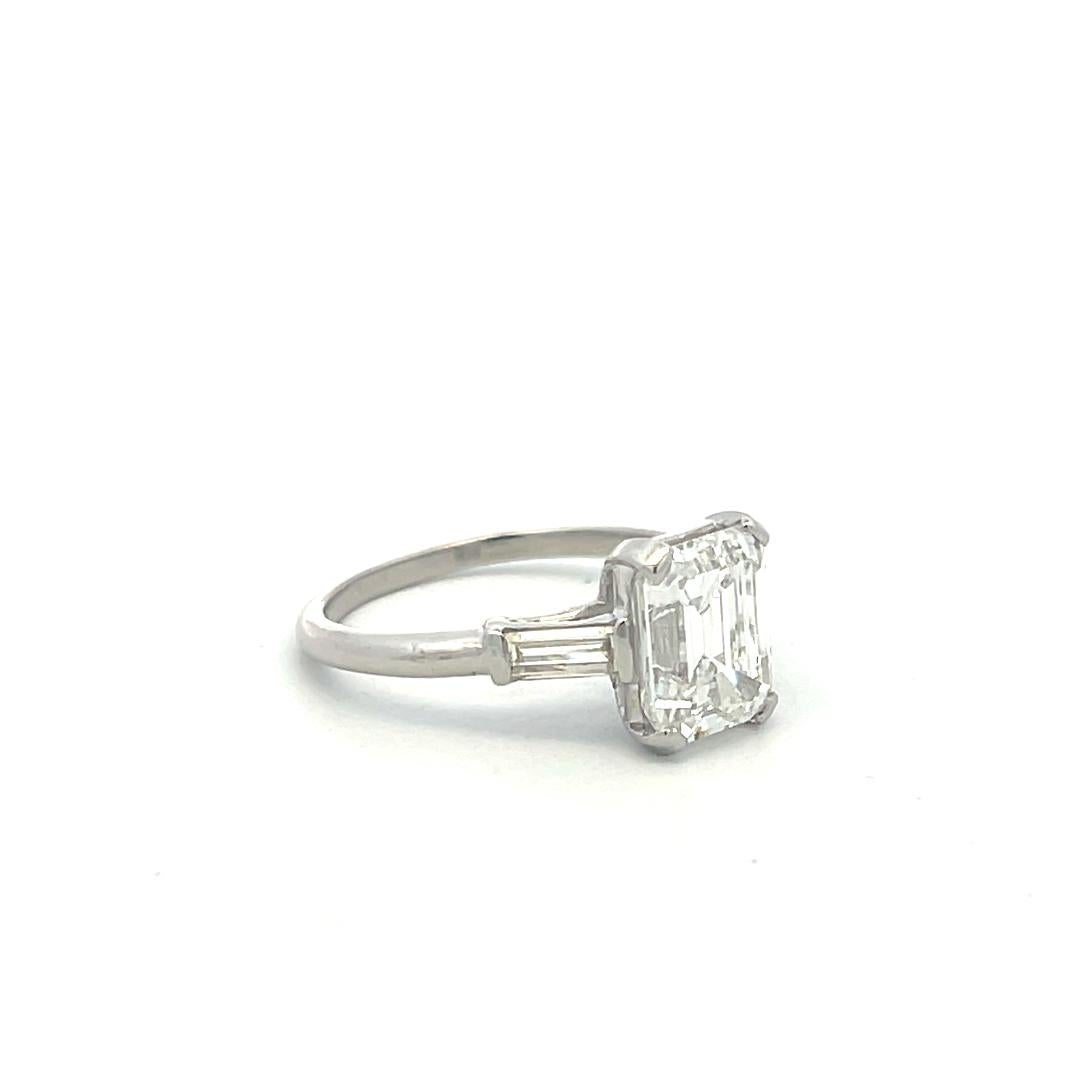3.45 Carat Emerald Cut and Baguette Shape Diamond Platinum Engagement Ring For Sale 4