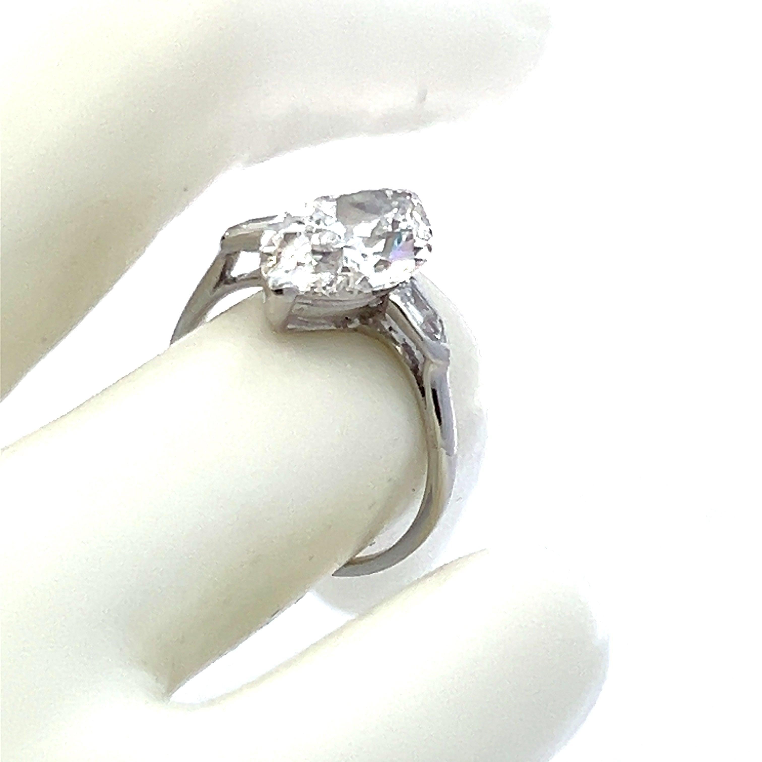 Title:
3.45 Carat Marquis Shape H VVS1 and Bullets Shape H VS1 Diamond Platinum Engagement Ring


Style:
Engagement


Metal:
Platinum


Gemstone 1:
3.23 Carat Diamond


Number of Stones:
1


Color:
H


Clarity:
VVS1


Shape:
Marquis