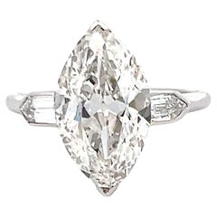 Anillo de compromiso en platino con diamantes en forma de marqués y balas de 3,45 quilates