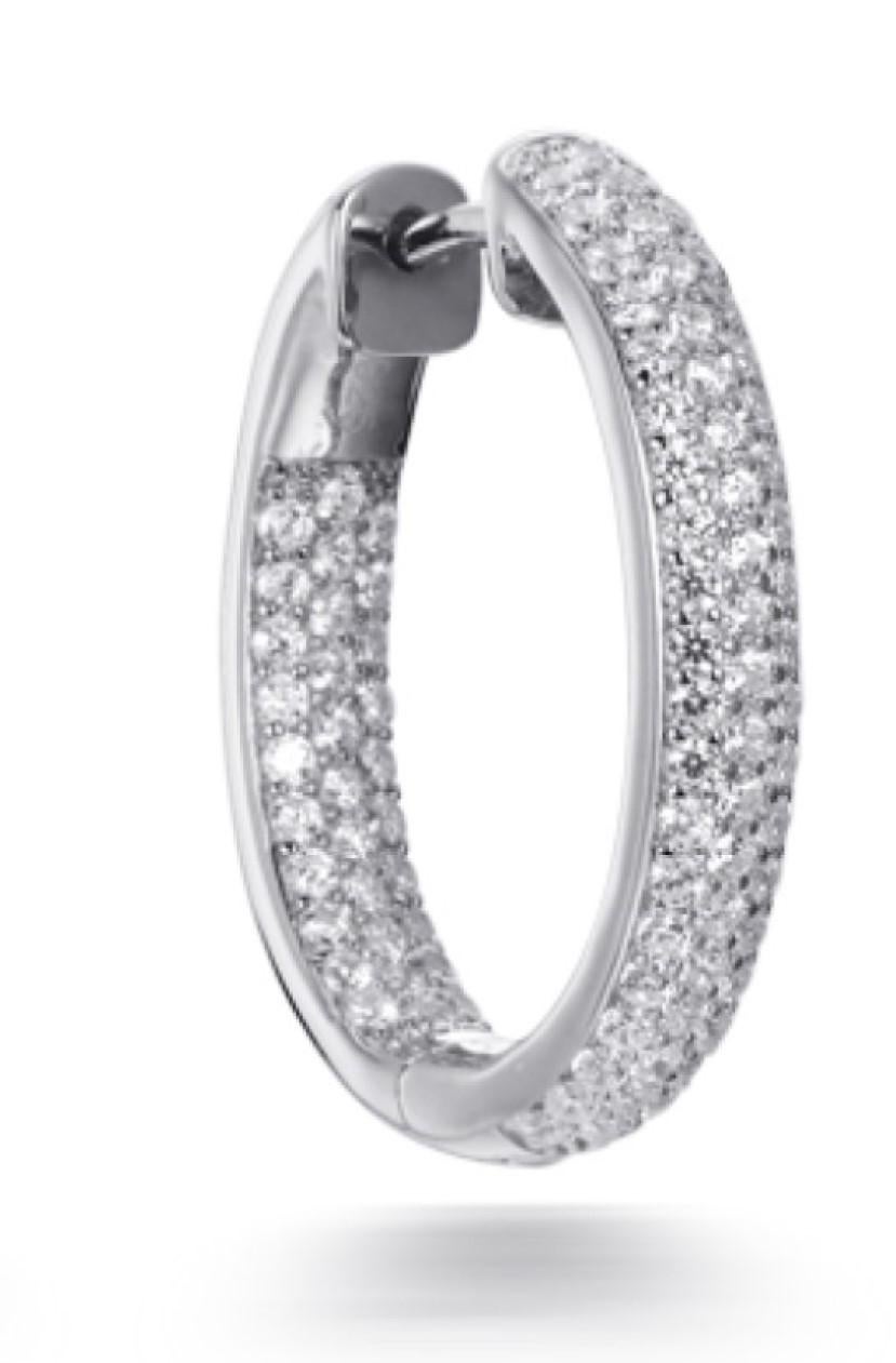 A dazzling pair of hoop earrings, effortless to wear, adding a hint of glamour to any occasion.

Featuring 3.45ct of round brilliant cut cubic zirconia, micro set into 925 sterling silver with a high gloss white rhodium finish.

Dimensions: 20mm