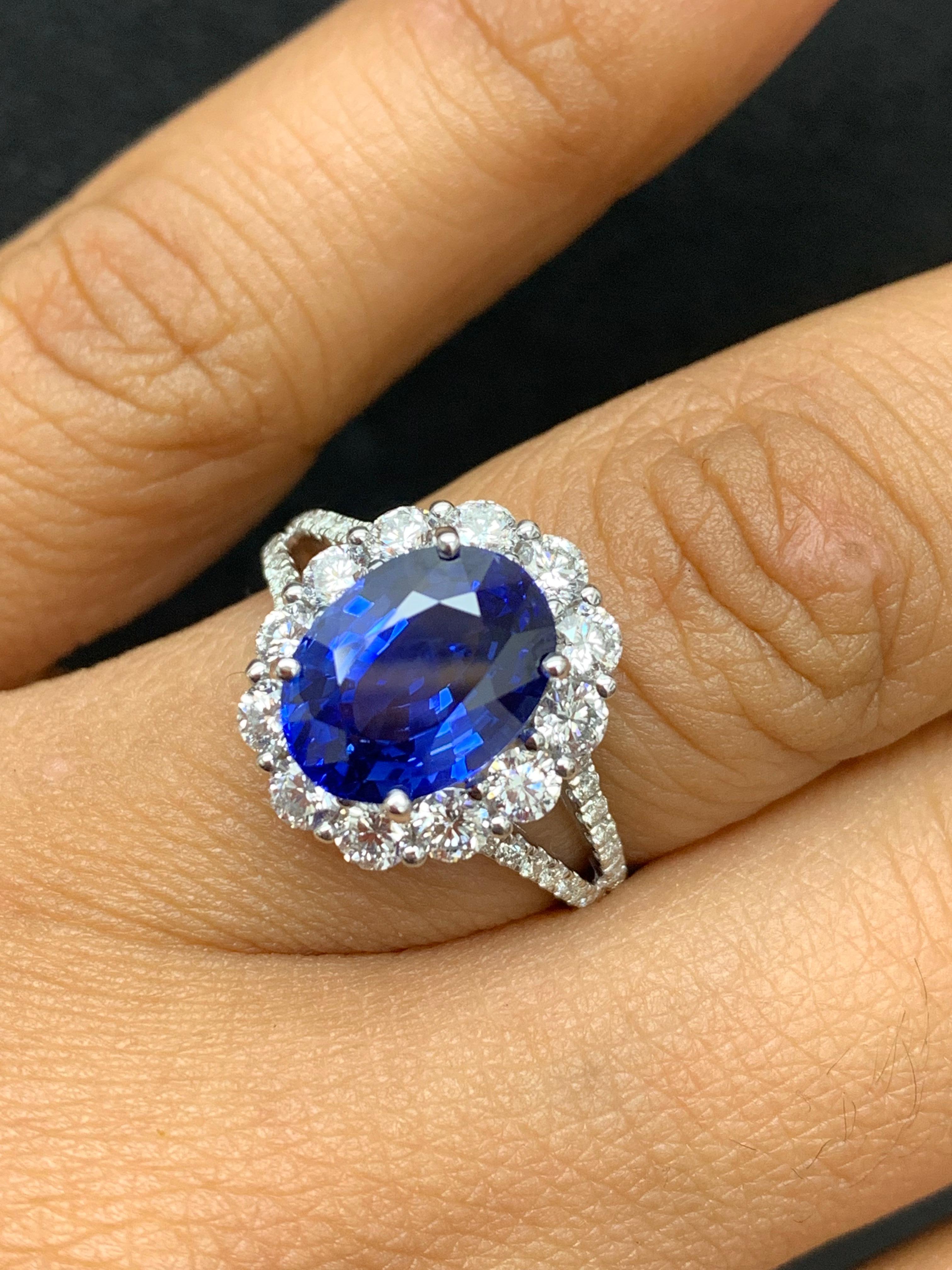 Women's 3.45 Carat Oval Shape Blue Sapphire and Diamond Flower Ring in 18K White Gold For Sale