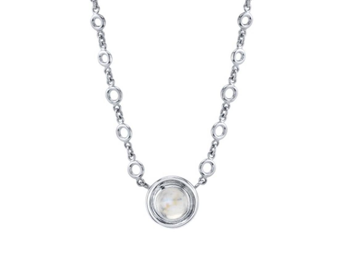 This gorgeous necklace featuring a fine quality rainbow moonstone is understated yet dazzling! While white moonstones exhibit glowing adularescence or 