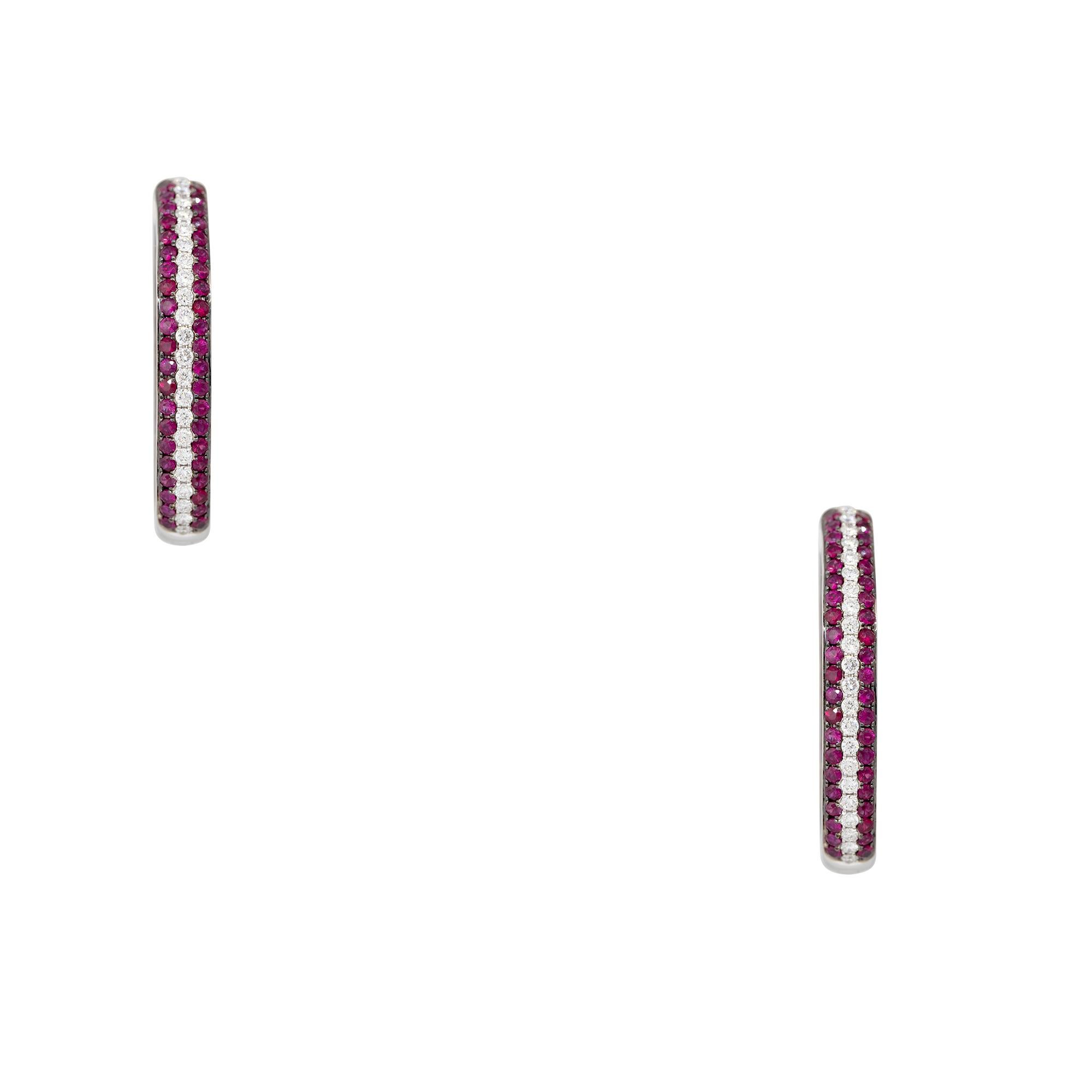 18k White Gold 3.45ctw Ruby & 1.42ctw Diamond Inside Out 3-Row Hoop Earrings
Material: 18k White Gold
Gemstone/Diamond Details: There are approximately 3.45 carats of round brilliant cut Rubies and approximately 1.42 carats of round brilliant cut