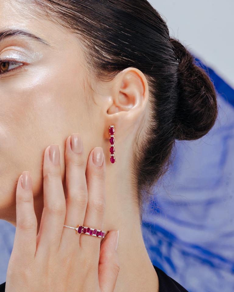 Natural Deep Red Ruby and Diamond Earrings in 14K Gold to make a statement with your look. You shall need stud earrings to make a statement with your look. These earrings create a sparkling, luxurious look featuring oval cut ruby.
Ruby improves