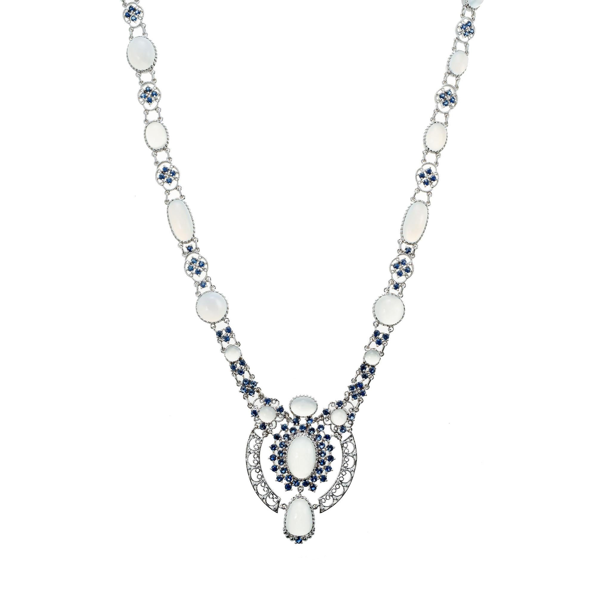 Museum of Modern Art genuine Moonstone and Sapphire pendant necklace. All genuine stones in 14k white gold. 17.5 inches. MMA pieces are usually remakes of important or historical pieces, we do not know the history of this one.

19 Moonstone, clear
