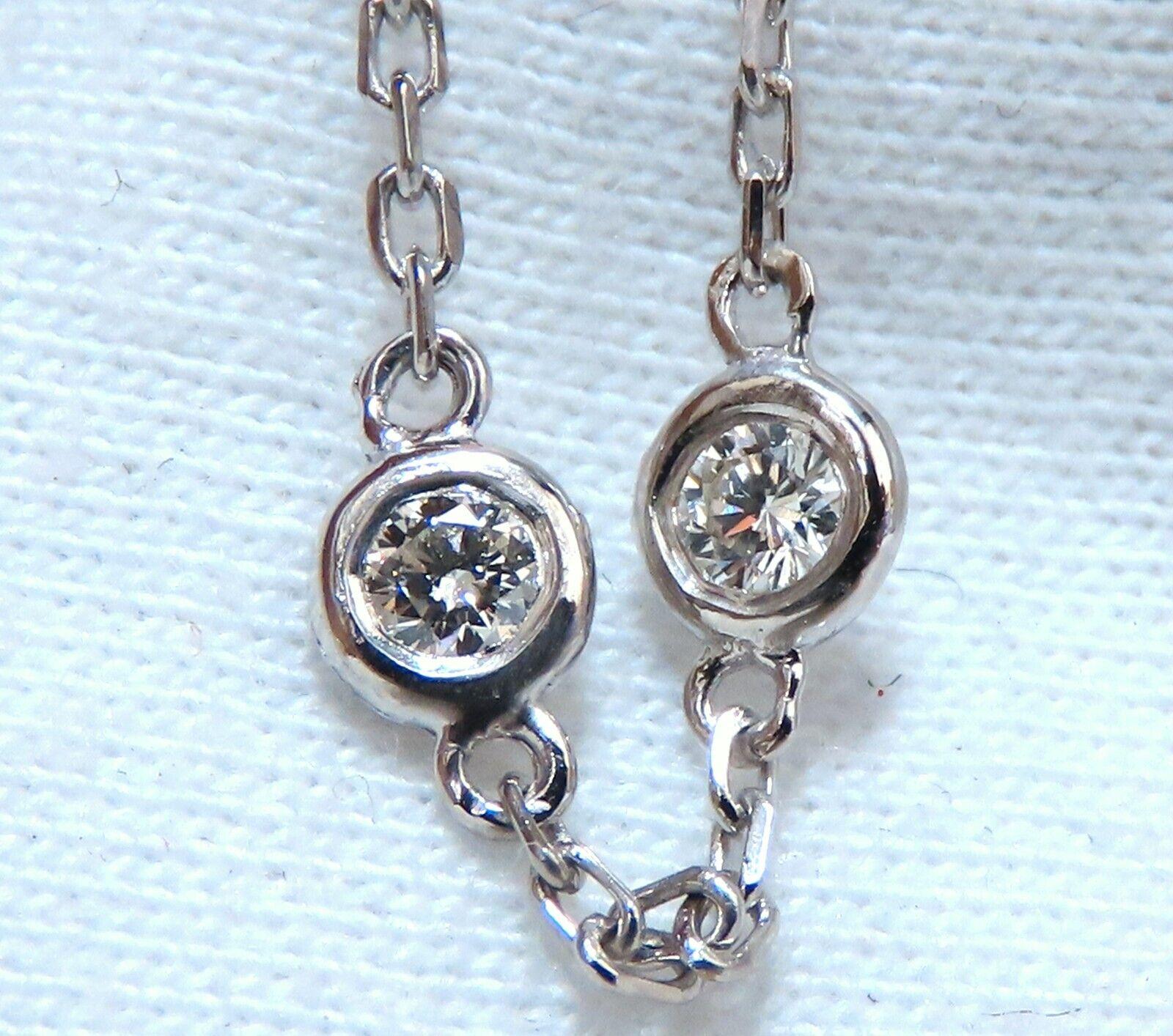 3.45ct. Diamonds Station By Yard Necklace.
Double Wrap Version.


Natural Rounds, Full cuts.
G colors

Vs-2 clarity.


63 diamonds total count.

Total Necklace Length: 36 Inch.

14Kt White gold 

9 Grams

Diamonds mounted flush / smooth