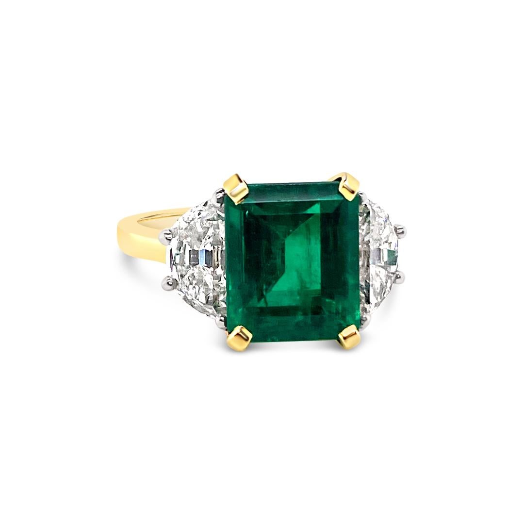 3.46 Carat Emerald and 1.56 Carat (total weight) Diamond Ring set in 18K Yellow Gold.  Diamonds are set in Platinum.