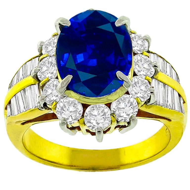 This charming 18k yellow gold ring is centered with an oval cut sapphire that weighs 3.46ct. The sapphire is accentuated by sparkling baguette and round brilliant diamonds that weigh 1.83ct. graded H color with SI clarity.
The ring is stamped 346