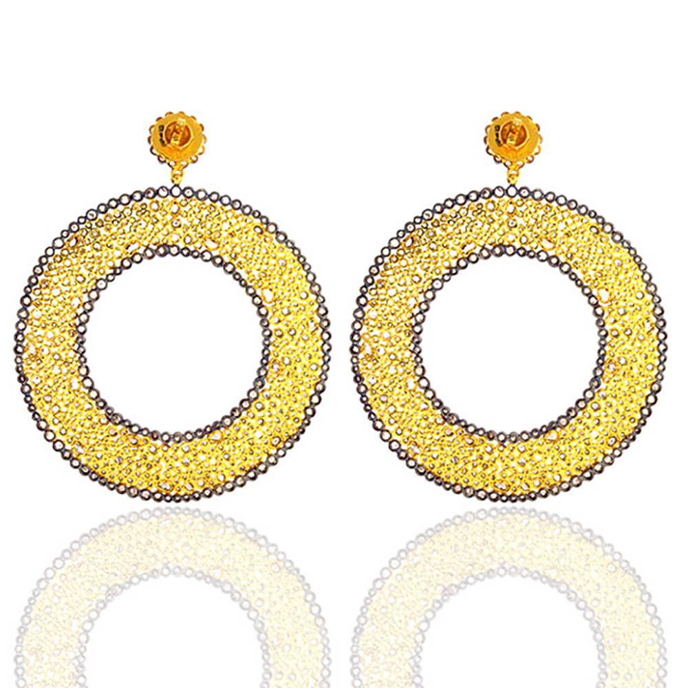 Bold & Extravagant uncut Diamond and 18K Yellow Gold Earring. This earring is huge but light in weight. 

Closure: Push Post

18KT:52.23g,
Diamond:34.66ct
