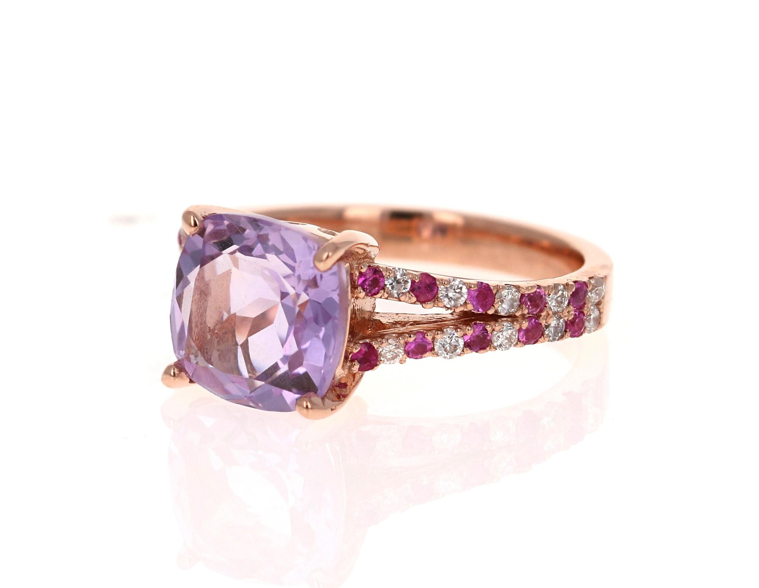 Amethyst and Pink Sapphire Ring! 

This cute and dainty Ring has a Cushion Cut Amethyst that weighs 2.90 Carats and is embellished with alternating 20 Pink Sapphires that weigh 0.33 Carats and 20 Round Cut Diamonds that weigh 0.24 Carats along the