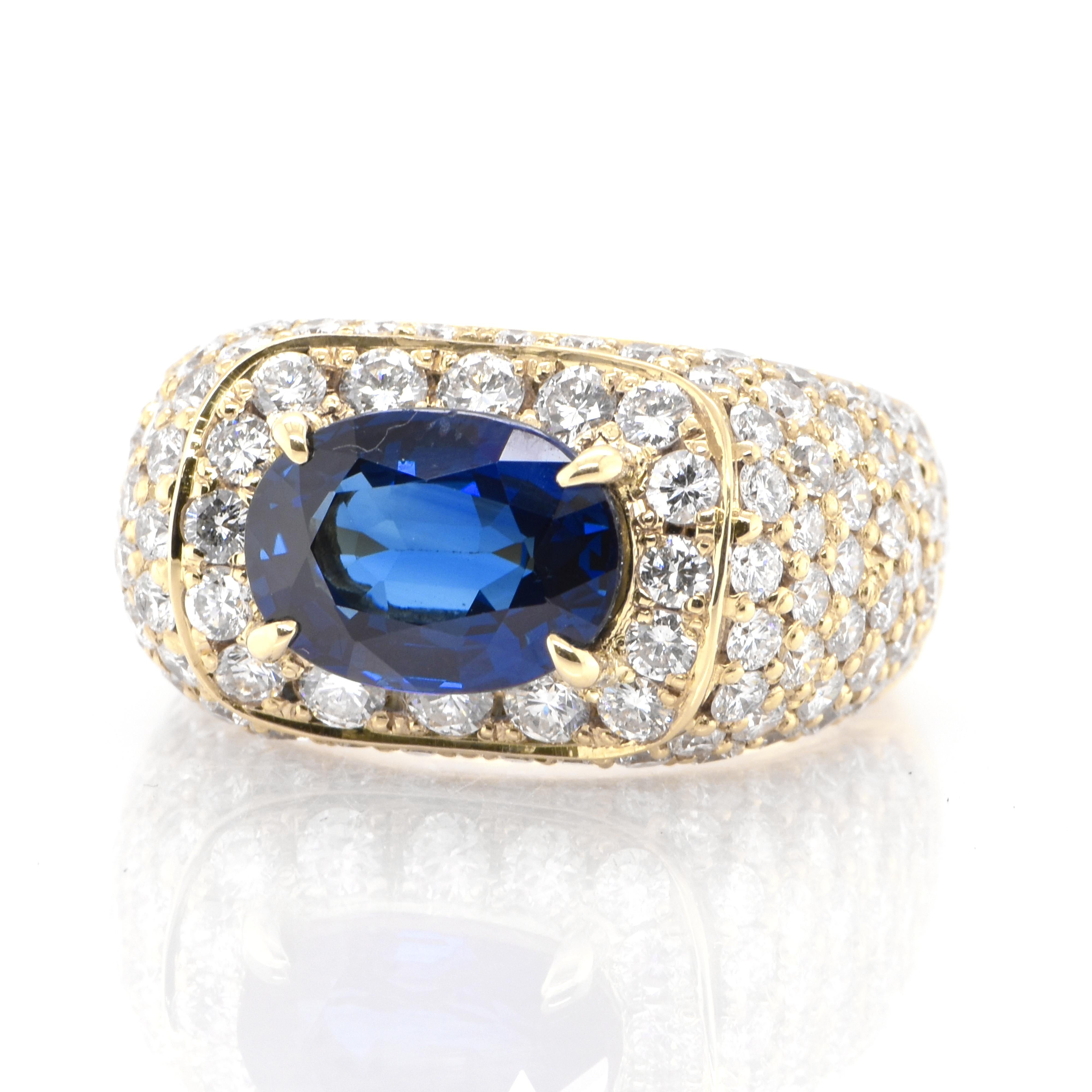 A beautiful ring featuring 3.47 Carat Natural Sapphire and 2.73 Carats Diamond Accents set in 18 Karat Yellow Gold. Sapphires have extraordinary durability - they excel in hardness as well as toughness and durability making them very popular in