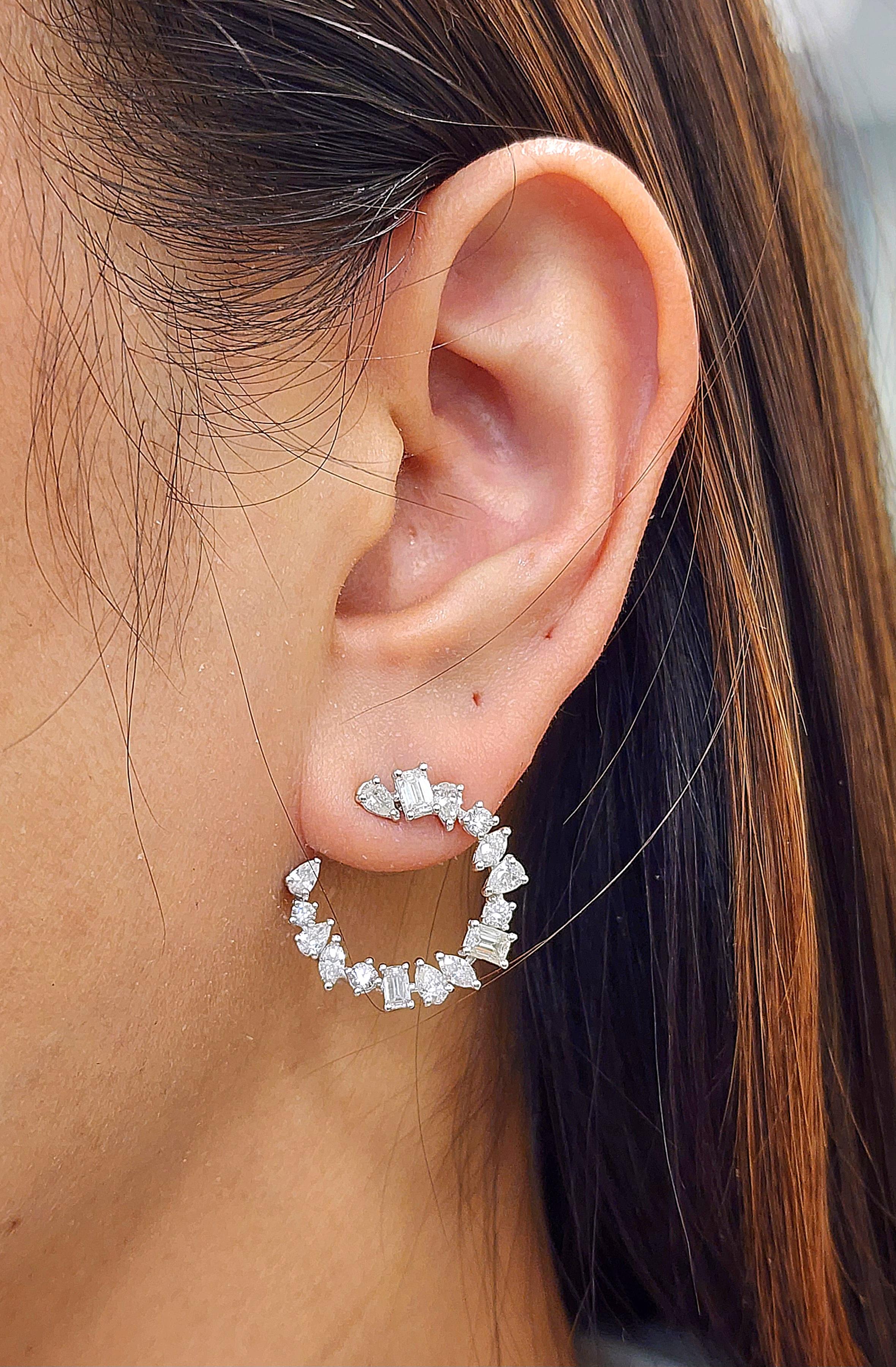 These 3.47 ct mixed shape diamond earrings are a true masterpiece. The well-made diamonds are beautifully cut and polished to perfection, creating a stunning sparkle that catches the eye. The mixed shapes add a unique touch to the earrings, making