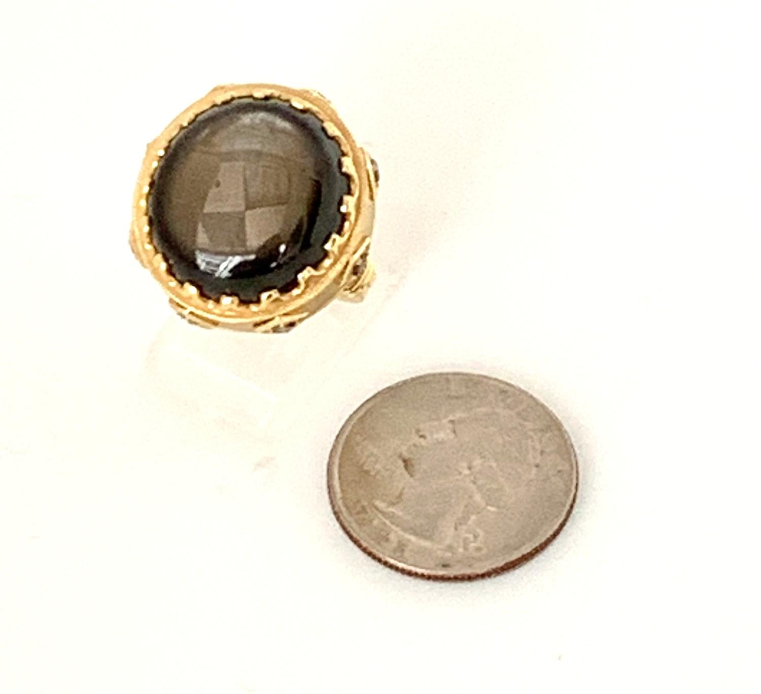 Artisan  34.70 Carat Oval Black Star Sapphire and Black Diamond 18k Yellow Gold Ring