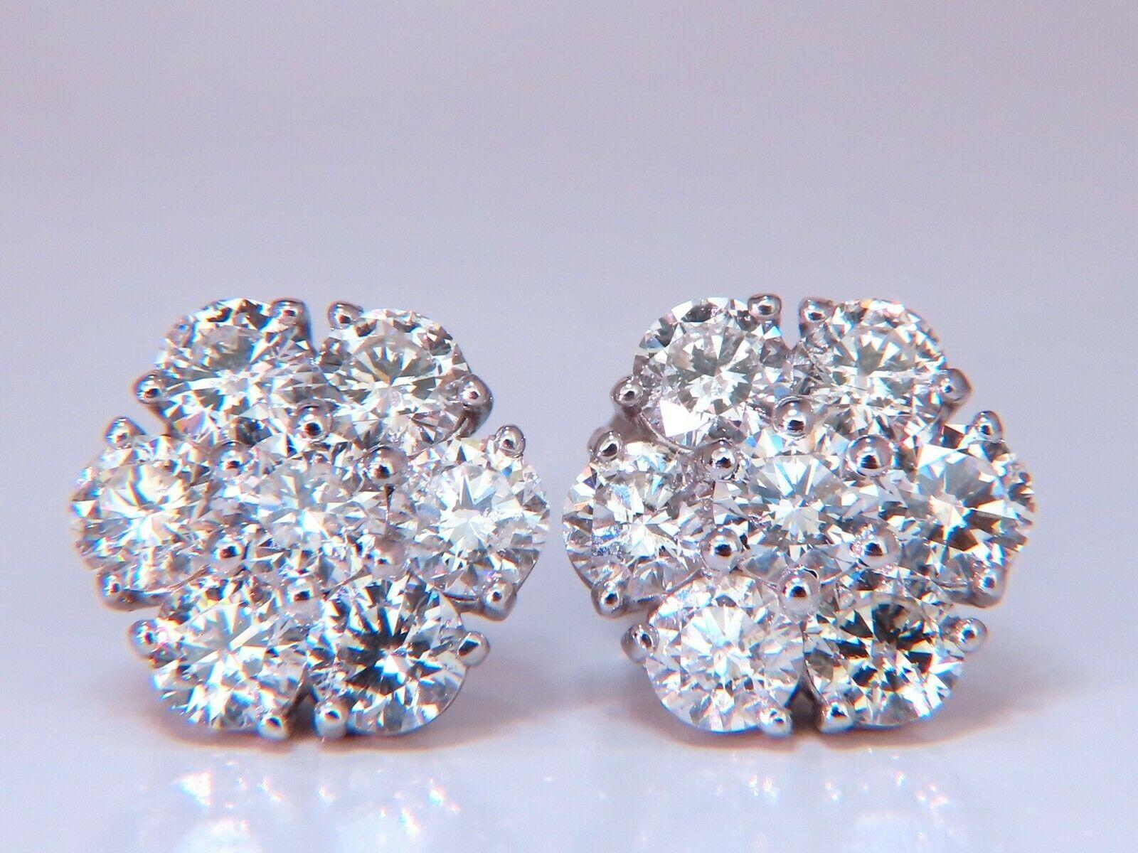Floreta cluster snowflake diamond earrings.

3.47 carat natural round diamonds

G -Hcolor vs2 Si1 clarity

14 karat white gold 4.6 g

Earrings measure 12mm wide

$18,000 appraisal certificate to accompany