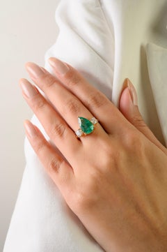 3.47Ct Pear Cut Emerald & Diamond Three Stone Engagement Ring in 14K Yellow Gold