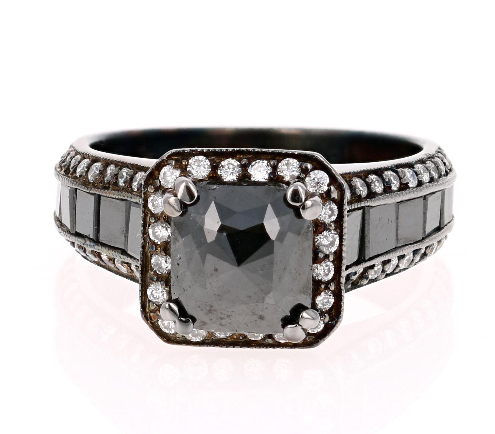 Truly a unique piece!!  A Black and White Diamond Ring in a Black Rhodium finish for a Vintage-Inspired look. This ring has a 1.50 carat Black Diamond in the center of the ring which is surrounded by 72 Round Cut Diamonds that weigh 0.44 Carats.  On