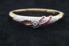 3.48 Carat Diamond and Ruby Bangle in 18 Karat Gold