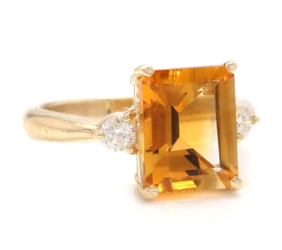 3.48 Carats Impressive Natural Citrine and Diamond 14K Yellow Gold Ring

Total Natural Citrine Weight is: Approx. 3.30 Carats

Citrine Measures: Approx. 10.00 x 8.00mm

Natural Round Diamonds Weight: Approx. 0.18 Carats (color G-H / Clarity