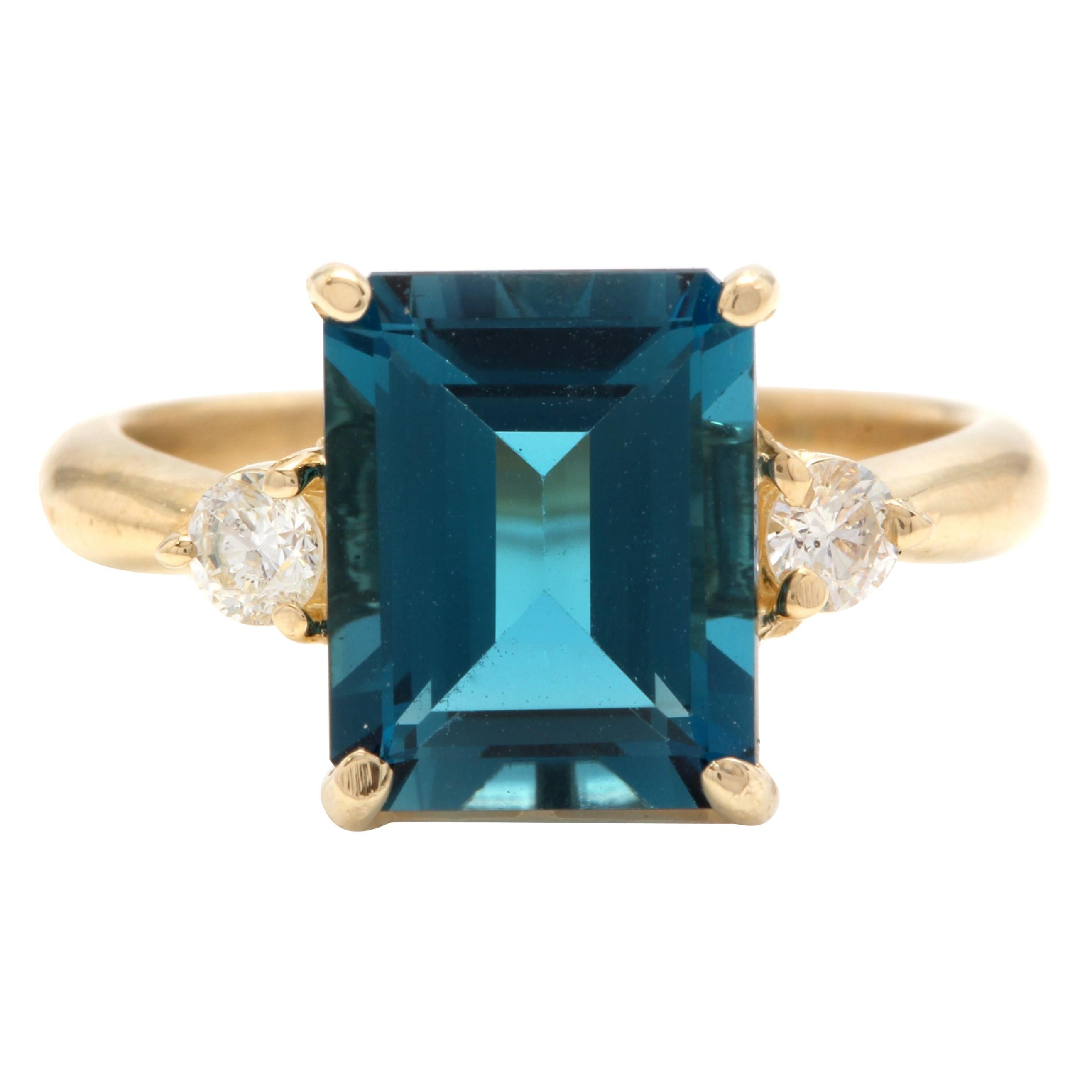 Impressionnante bague en or jaune 14 carats avec topaze bleue naturelle de Londres de 3,48 carats et diamants