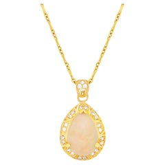 3.48 Carat Oval Opal and Diamond Pendant Necklace 3.48 Carat Oval Opal and Diamond Pendant Necklace