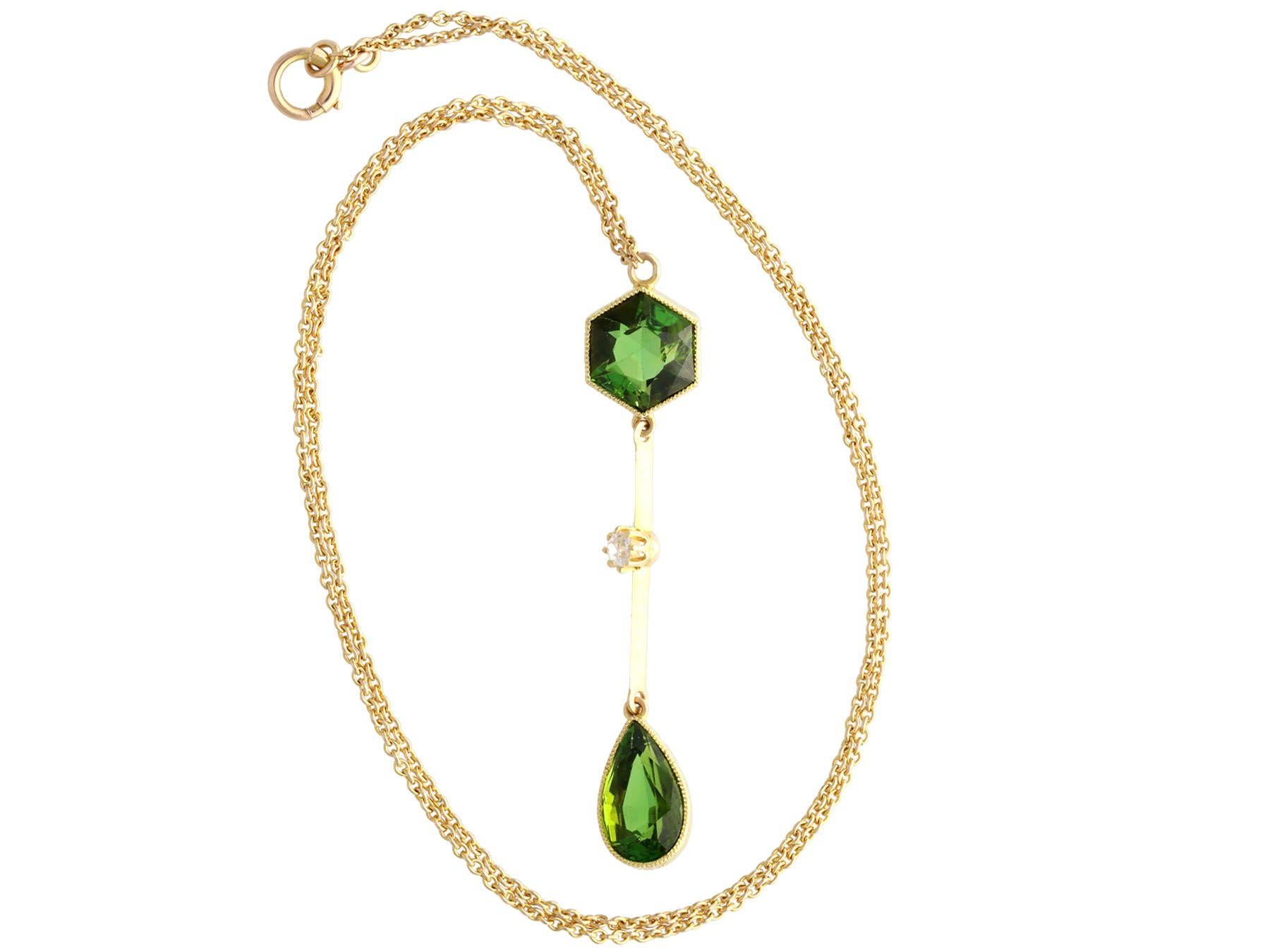 A stunning, fine and impressive antique 3.48 carat tourmaline and diamond, 15 karat yellow gold necklace; part of our diverse antique jewellery and estate jewelry collections.

This stunning antique tourmaline pendant necklace has been crafted in