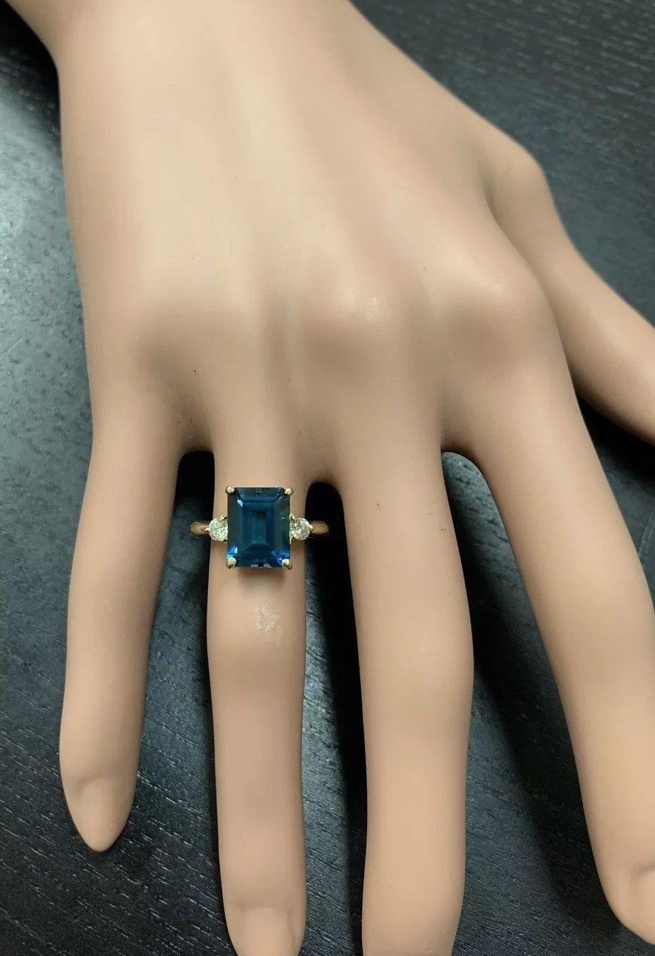 Impressionnante bague en or jaune 14 carats avec topaze bleue naturelle de Londres de 3,48 carats et diamants en vente 3