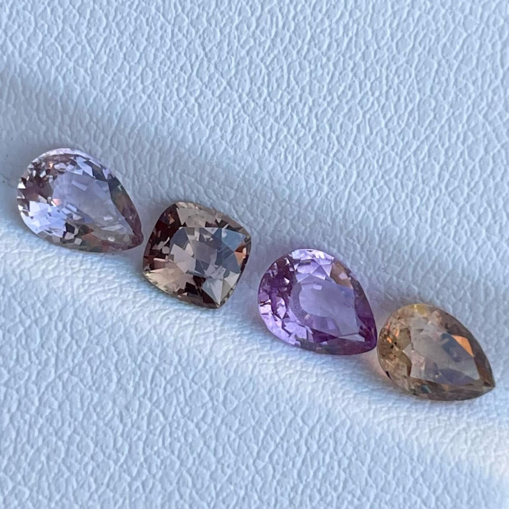 Gemstone Type Colorful Natural Sapphire From Africa
Weight 3.48 carats
Each weight 0.78, 0.99, 0.85 and 0.84 carats
Clarity VVS
Origin Madagascar
Treatment Heated





Sourced from the heart of Africa, these sapphires boast a vivid spectrum of