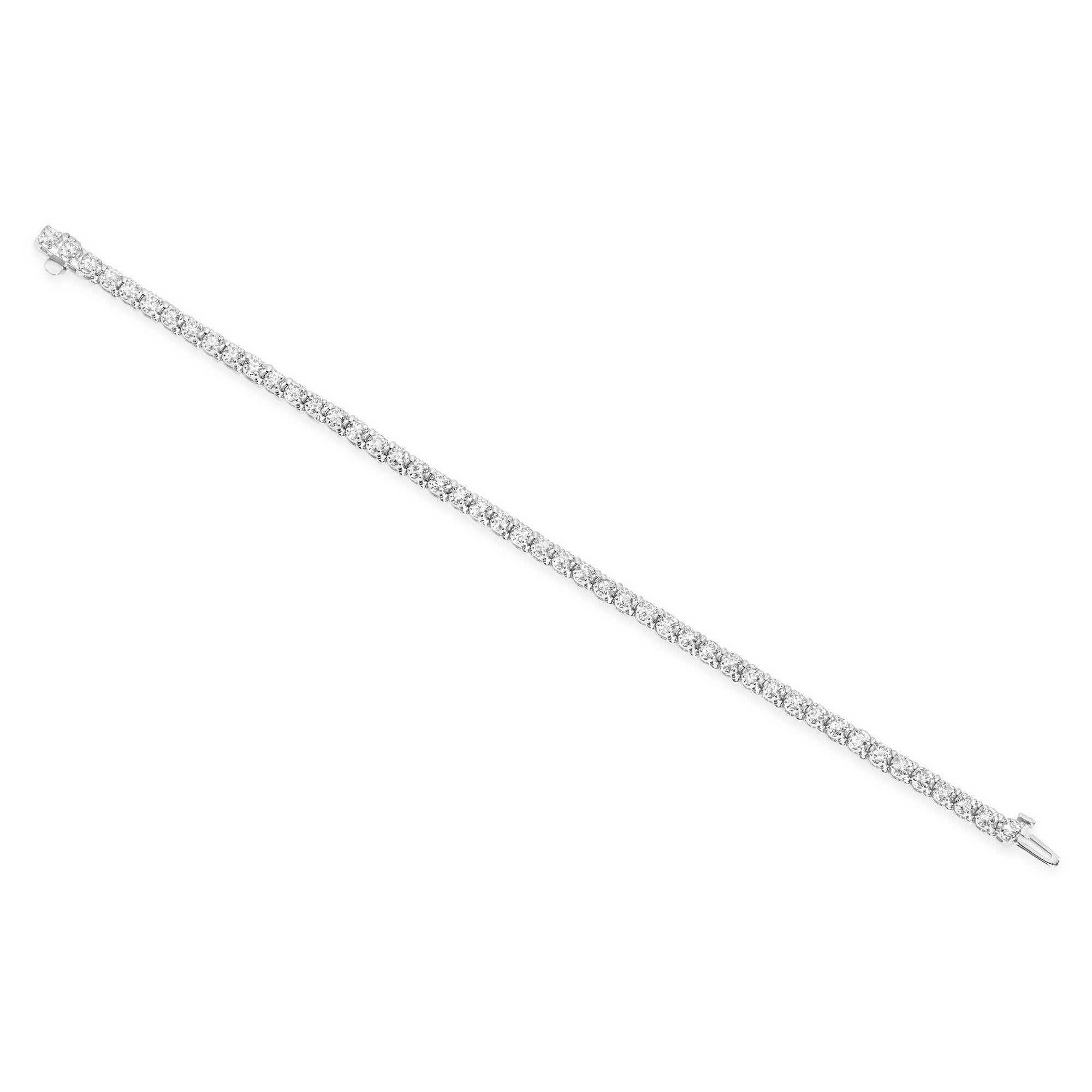 A classic tennis bracelet, showcasing 47 round brilliant cut diamonds weighing 3.48 carats total with approximately F-VS color and SI1 clarity, set on a polished 14K white gold. Perfect complement to any outfit.

Roman Malakov is a custom house,
