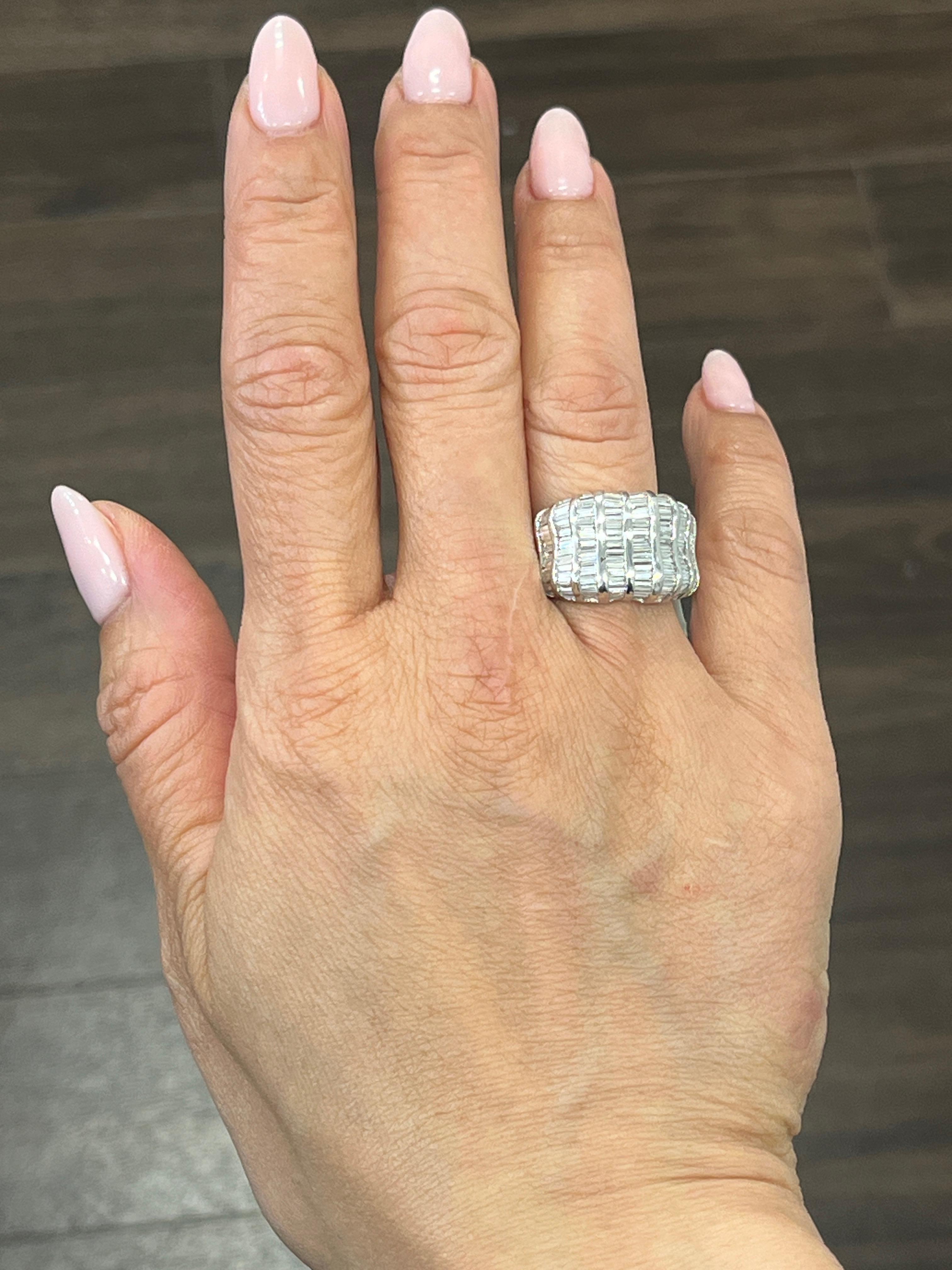 This exquisite ring is a stunning piece of fine jewelry that features a 3.48 carat baguette cut diamonds set in 18k white gold. The diamonds have a clarity grade of VS1/VS2 and a color grade of G/H, and is accented beautifully by the white gold