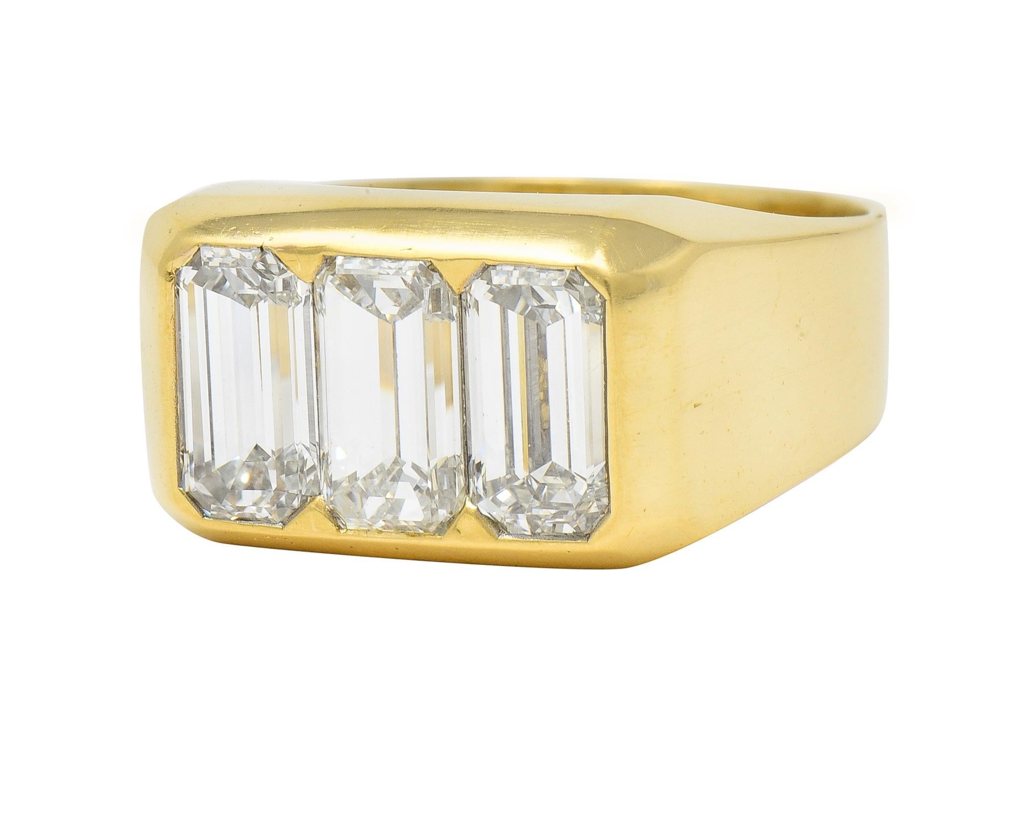 3.48 CTW Flush Emerald Cut Diamond 18 Karat Yellow Gold Vintage Three Stone Ring For Sale 2