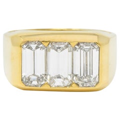 3.48 CTW Flush Emerald Cut Diamond 18 Karat Yellow Gold Retro Three Stone Ring
