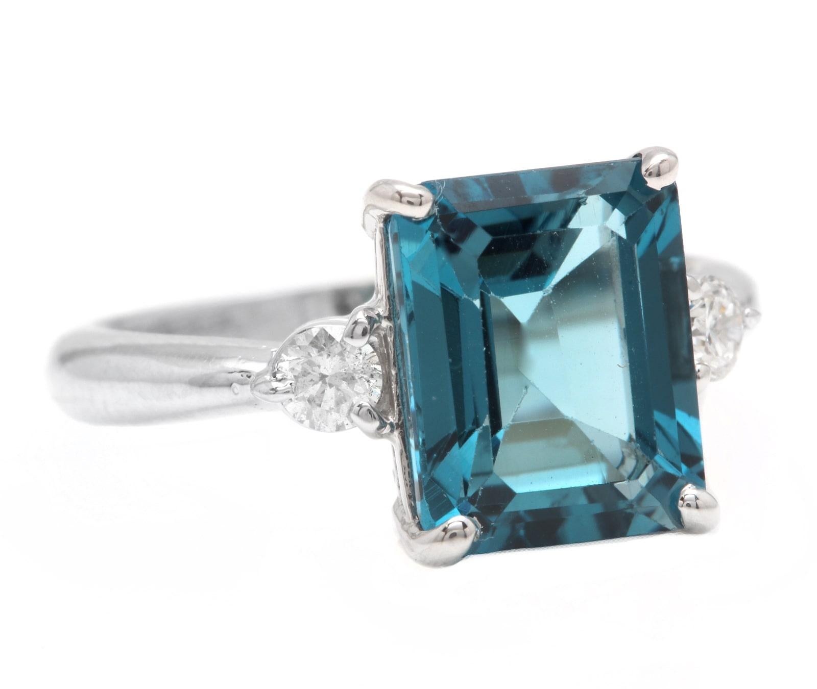 3.48 Carats Impressive Natural London Blue Topaz and Diamond 14K Solid White Gold Ring

Suggested Replacement Value: Approx. $3,000.00

Total Natural London Blue Topaz Weight is: Approx. 3.30 Carats

Topaz Measures: Approx. 10.00 x 8.00mm

Natural
