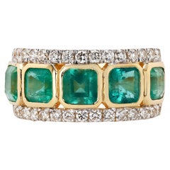 3.48ctw Emerald and 0.63ctw Diamond 18k Yellow Gold Ring