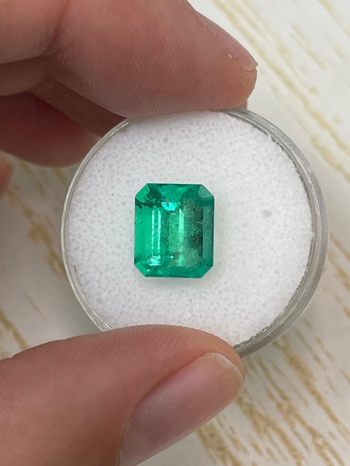 Stone: Emerald
Weight: 3.49-carats
Shape: Emerald Cut
Clarity: Transparent
Luster: Very Good
Color: Muzo Yellowish Green
Measurements: 10.05mm x 8.52mm x 6.03mm
Geographic Origin: Colombia
Treatment: Natural, Oiling

Comments: Due to their growth