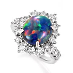 Anillo de ópalo negro australiano natural de 3.49 quilates y diamantes en platino