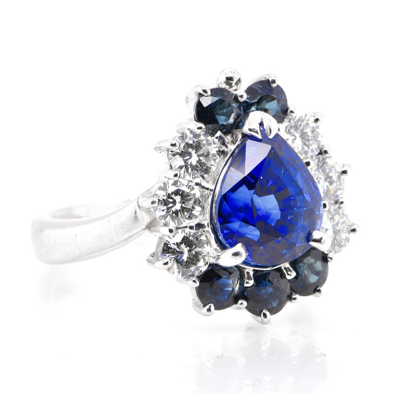 Modern 3.49 Carat Natural Blue Sapphire and Diamond Halo Ring Set in Platinum For Sale