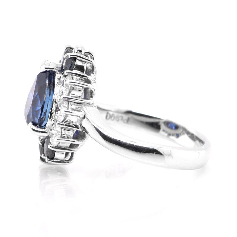 Pear Cut 3.49 Carat Natural Blue Sapphire and Diamond Halo Ring Set in Platinum For Sale