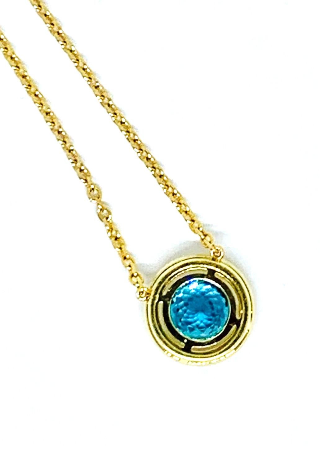 Simple and stunning, this blue zircon pendant is a timeless piece! The blue zircon is a very brilliant 