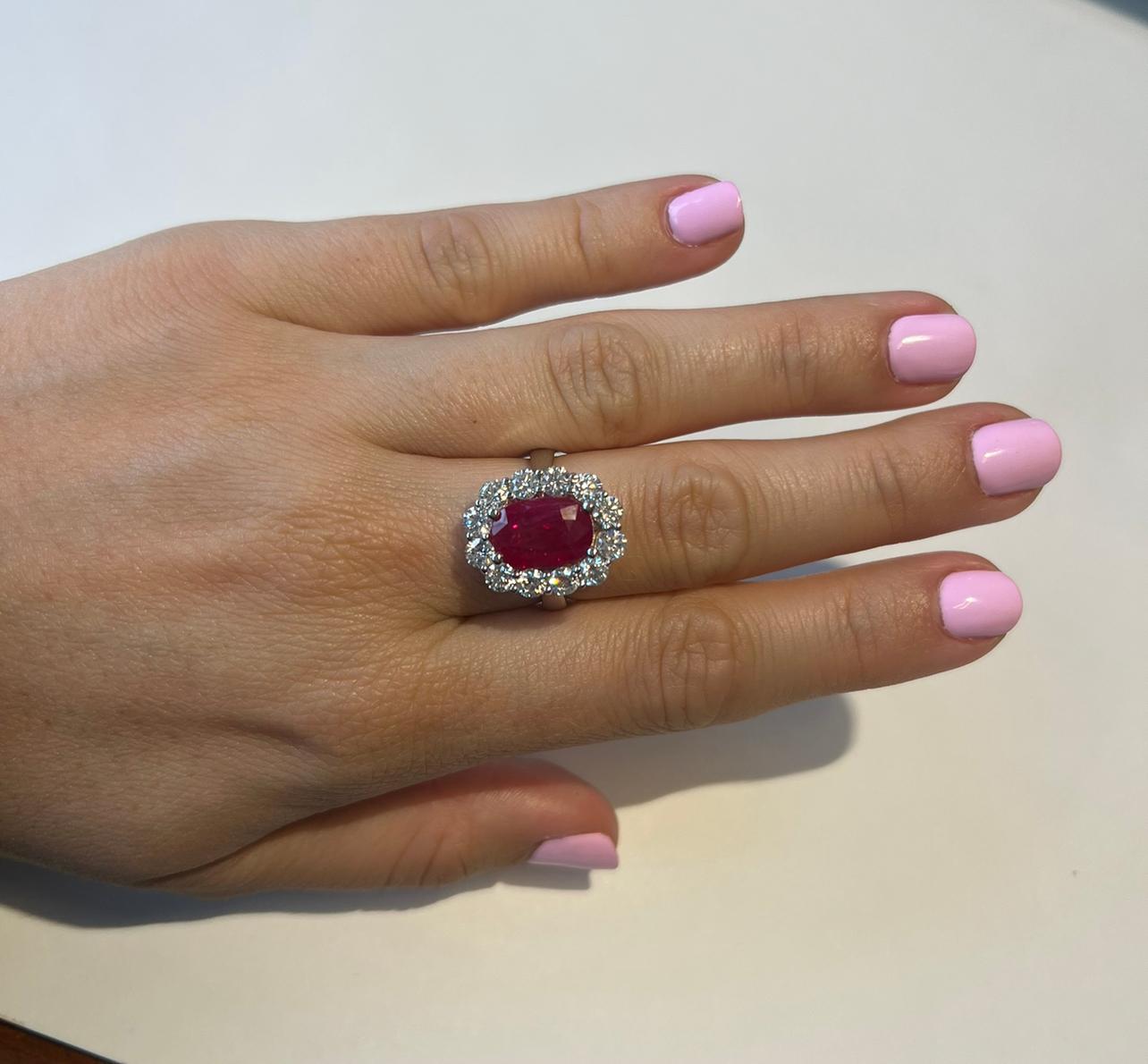 3.49 carat Natural Earth Mined Ruby
Surrounded by 1.80 carats of natural earth mined Diamonds
Ring measures 0.75 inches tall and .50 inches wide
18kt White Gold
Made in the USA in Miami, FL


Experience the allure of our exquisite 3.49 carat Natural