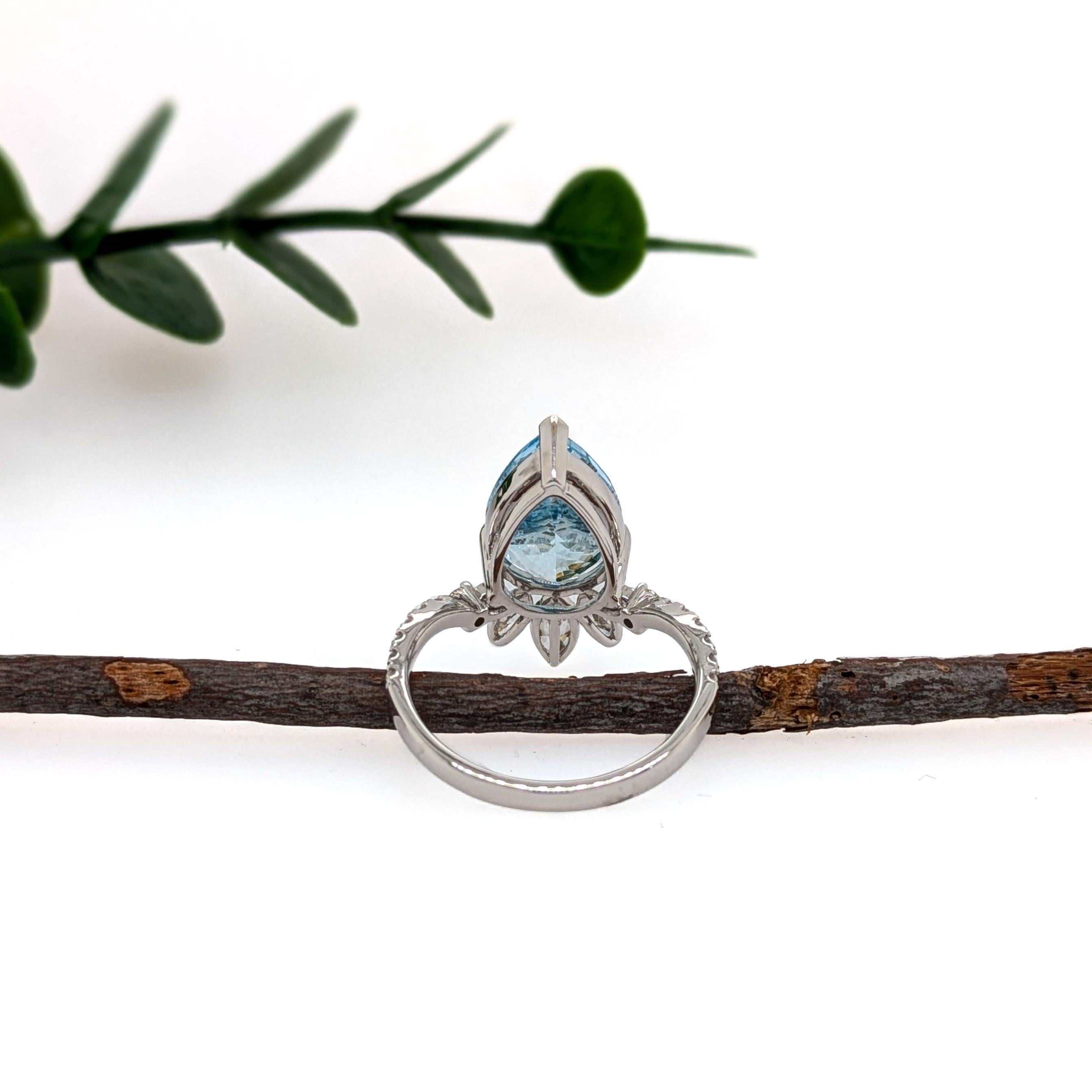 This stunning 3.4-carat aquamarine ring features a beautiful, vibrant gemstone set in 14k solid gold, complemented by sparkling earth-mined diamonds. A perfect blend of elegance and luxury, this ring is a timeless addition to any collection. This